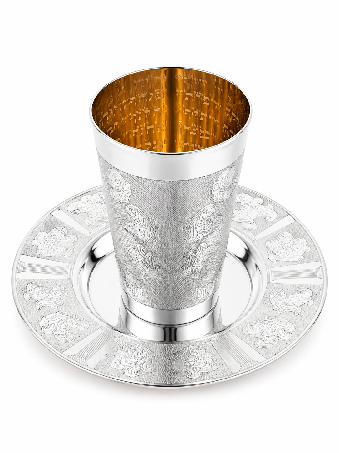 A silver Kiddush cup with an ornate floral engraving pattern, shown on a matching silver Kiddush plate by hadad bros silverware