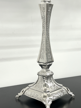 Silver Menorah on a white background