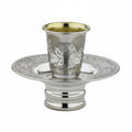 Silver kiddush cup mayim achronim with ornate design on a white background
