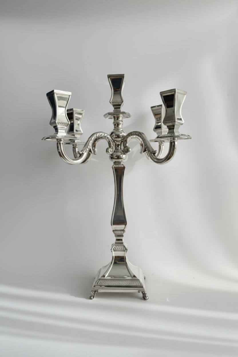 hadad bros Silver candelabra on a white background