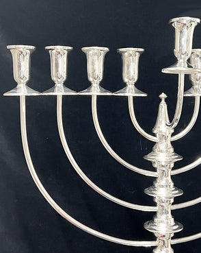 Silver Menorah on a black background