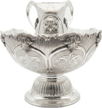 Decorative silver bowl and natla set with intricate engravings on a white background