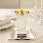 silver kiddush cup with a matching tray
