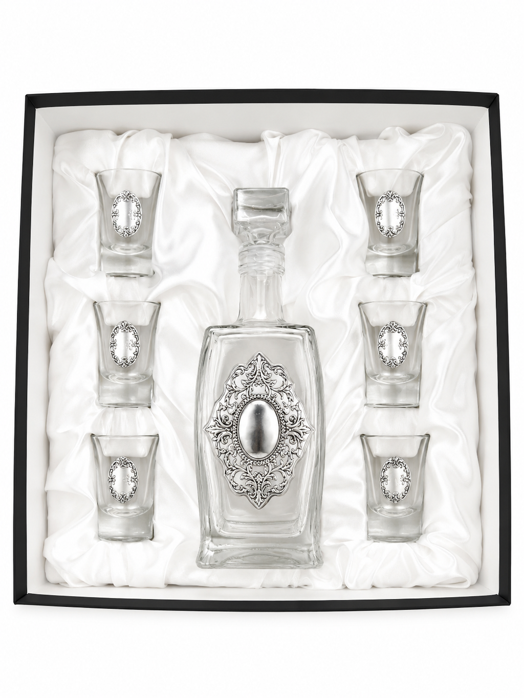 A crystal glass decanter with6 matching shot glasses by hadad bros silverware.