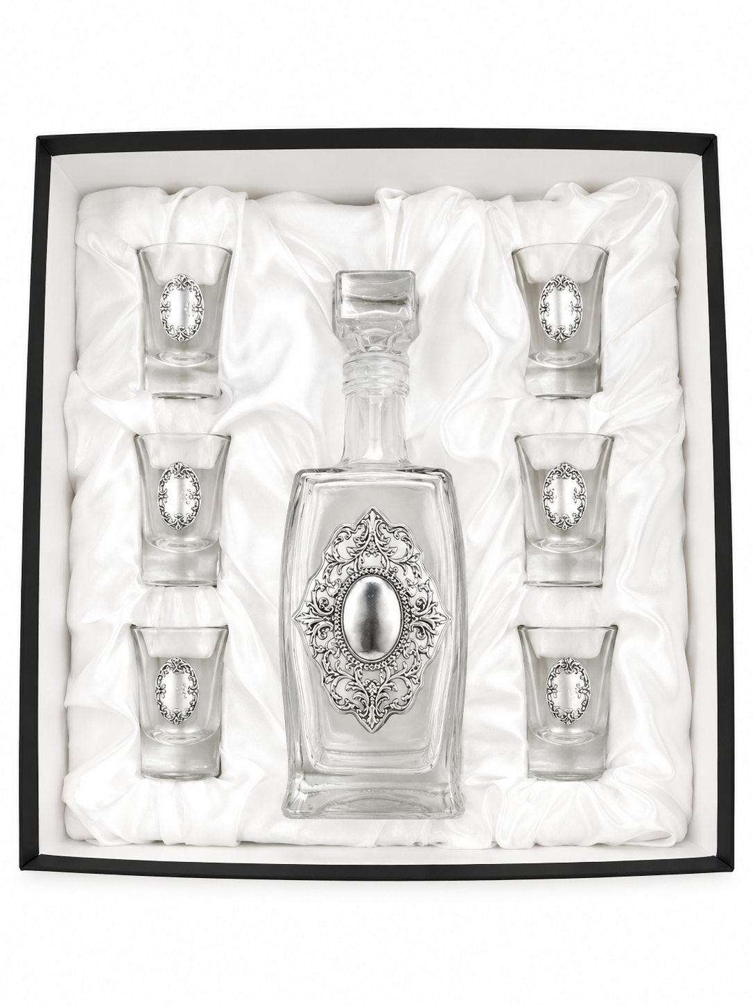 A crystal glass decanter with6 matching shot glasses by hadad bros silverware.