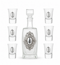 A crystal glass decanter with6 matching shot glasses by hadad bros silverware.