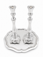 Two pure silver 925 candlesticks on a white background