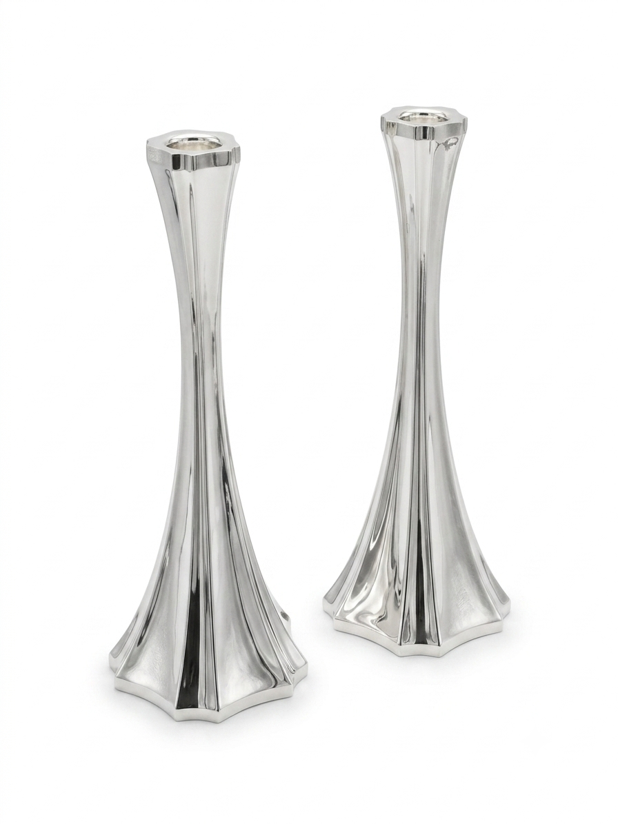 Two silver 925 candlesticks on a white background