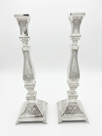 Pair of silver 925 candlesticks with decorative patterns by hadad bros