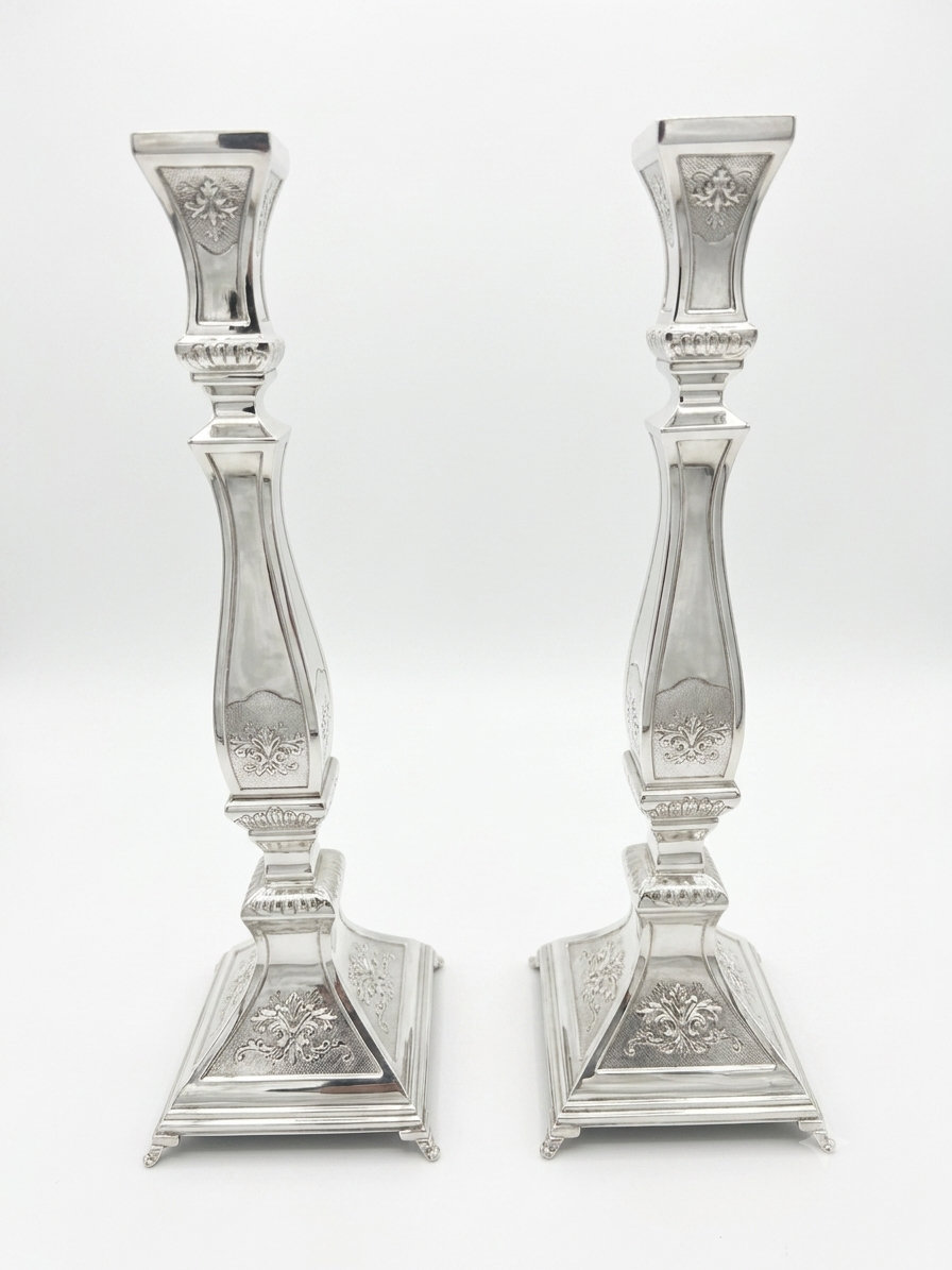 Pair of silver 925 candlesticks with decorative patterns by hadad bros