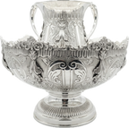 Decorative silver bowl and natla set with intricate designs on a white background