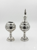 Havdala set with intricate designs on a white background