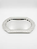 Silver decorative tray on a white background