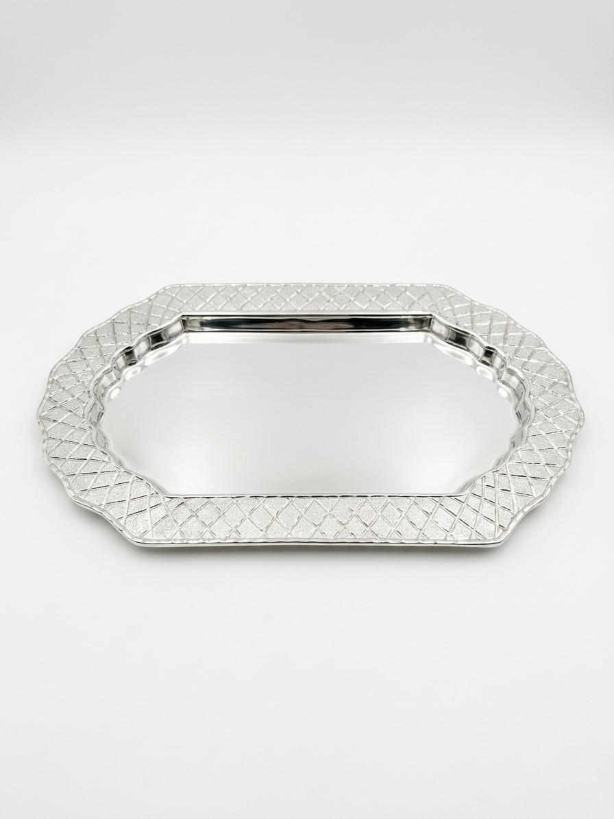Silver decorative tray on a white background