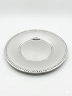 Silver tray plate with beaded edge on a white background