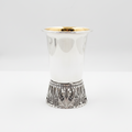 silver cup with smooth finish texture on a white background