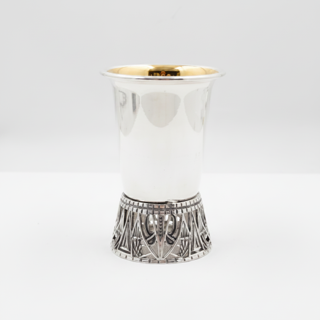 silver cup with smooth finish texture on a white background