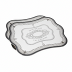 Two decorative challah bread trays with intricate designs on a white background